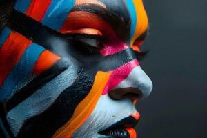 Avant-Garde Portrait With Colorful Face Paint. photo