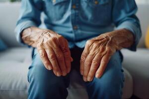 Hand of elder man. Concept of rheumatoid arthritis, osteoarthritis, or joint pain. photo