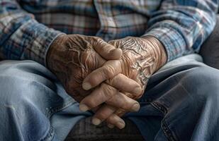 Hand of elder man. Concept of rheumatoid arthritis, osteoarthritis, or joint pain. photo