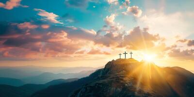 Three christian crosses on the mountain at sunrise, the crucifixion of Jesus Christ photo