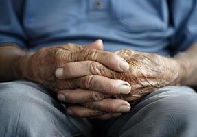 Hand of elder man. Concept of rheumatoid arthritis, osteoarthritis, or joint pain. photo