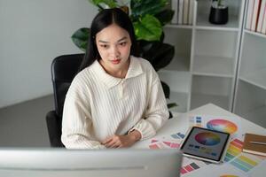 Asian woman graphic designer working in home office. Artist creative designer illustrator graphic skill concept photo