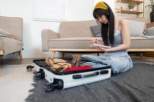 Woman and suitcase for travel summertime vacation packing clothing. relax and getaway preparation photo