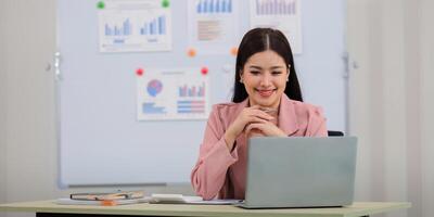 Business accounting woman counting on calculator working on financial document in hands closeup. Bookkeeping concept photo