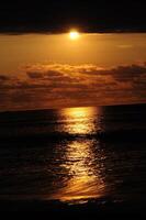 sunset at bali beach photo
