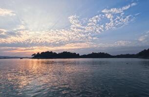 Sunset tranquil scenery of Kaptai lake Bangladesh photo