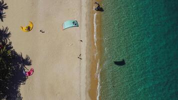 Aerial view of Kitesurfing on the waves of the sea in Mui Ne beach, Phan Thiet, Binh Thuan, Vietnam. Kitesurfing, Kiteboarding action photos