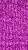 un púrpura toalla textura antecedentes foto