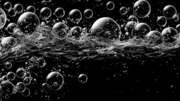 Soda water bubbles splashing underwater against black background. photo