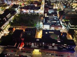 Aerial Night View of Illuminated Central Manchester City and Downtown Buildings, England United Kingdom. May 4th, 2024 photo