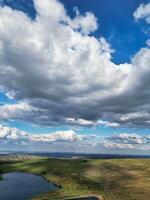 High Angle View of Most Beautiful British Landscape at Redmires Water Reservoirs over Hills of Sheffield City of England United Kingdom, April 30th, 2024 photo