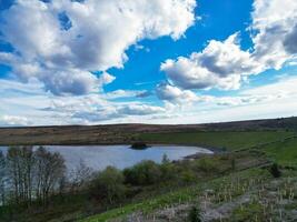 High Angle View of Most Beautiful British Landscape at Redmires Water Reservoirs over Hills of Sheffield City of England United Kingdom, April 30th, 2024 photo