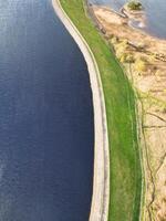 High Angle View of Most Beautiful British Landscape at Redmires Water Reservoirs over Hills of Sheffield City of England United Kingdom, April 30th, 2024 photo