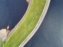 High Angle View of Most Beautiful British Landscape at Redmires Water Reservoirs over Hills of Sheffield City of England United Kingdom, April 30th, 2024 photo