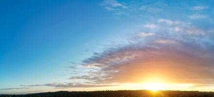 High Angle Panoramic View of Sky and Clouds During Sunrise, Luton, England UK photo