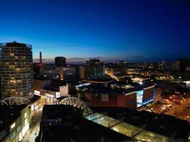 Aerial Night View of Illuminated City Centre Buildings of Birmingham Central City of England United Kingdom. March 30th, 2024 photo