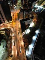 Aerial Night View of Illuminated City Centre Buildings of Birmingham Central City of England United Kingdom. March 30th, 2024 photo