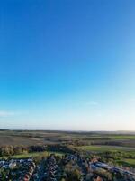 Aerial View of British Countryside Landscape Near Oxford City, Oxfordshire, England UK During Sunrise Morning. March 23rd, 2024 photo