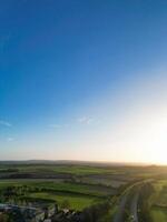 Aerial View of British Countryside Landscape Near Oxford City, Oxfordshire, England UK During Sunrise Morning. March 23rd, 2024 photo