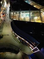aéreo noche ver de iluminado ciudad centrar edificios de Birmingham central ciudad de Inglaterra unido Reino. marzo 30, 2024 foto