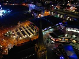 aéreo noche ver de iluminado ciudad centrar edificios de Birmingham central ciudad de Inglaterra unido Reino. marzo 30, 2024 foto