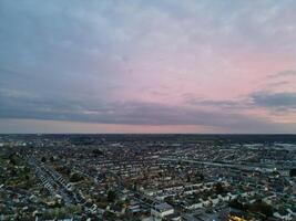 Most Beautiful Aerial View of Residential District During Orange Sunset over Luton, England UK. March 19th, 2024 photo