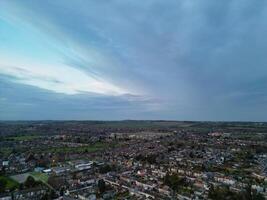 Most Beautiful Aerial View of Residential District During Orange Sunset over Luton, England UK. March 19th, 2024 photo