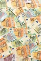 Many european euro money bills. Lot of banknotes of european union currency photo