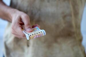 Man hand with indian rupees bills. Concept of financial operations in cash in India photo