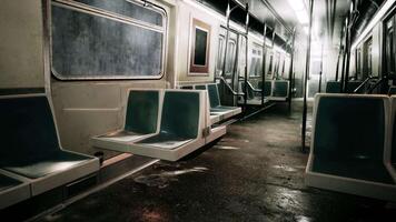 Empty seats in a metro train car with a blackboard on the wall video