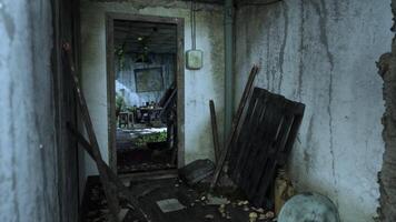 An abandoned room with a chair, showcasing the devastation and decay video