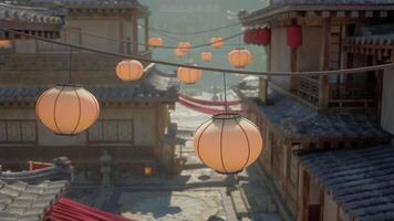 Lanterns hanging from a line over a street video