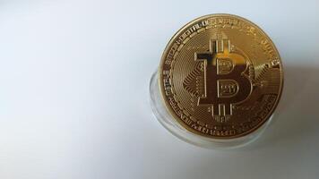 close up view of bitcoin isolated on white with free space for photocopying. photo
