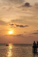 sunlight reflecting on the sea surface at dusk. photo