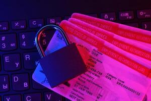 US Employment authorization card with small padlock on computer keyboard photo