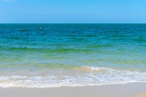 Soft wave on the beach photo