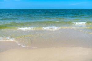 Soft wave on the beach photo