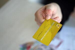 Indonesian golden social security card originally called Kartu perlindungan sosial photo