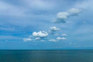 Minimal sea with tiny clouds photo