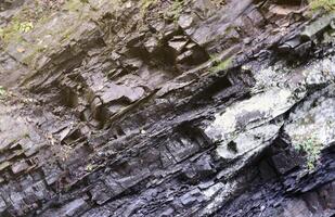 texturizado áspero rocas con lote de pequeño detalles foto