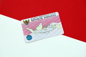 Indonesia child identity card Kartu Identitas Anak or KIA card. ID document for indonesian children photo