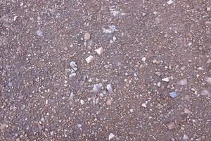 Background of shattered stony stones surface in mountain area. Texture with natural light photo