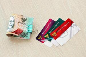 Indonesian prosperous family card, smart indonesia card and healthy card. KIS, KIP and KKS cards photo