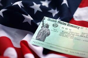 United States Treasury Refund check on waving American Flag photo