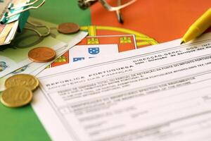 Portugal tax form Mod 21 RFI Double Taxation Relief on portugese flag photo