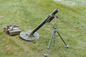 Portable mortar complex, a gun of the Soviet troops of the Second World War, a long-range combat weapon, throwing shells at a distance, Russian weapons. photo