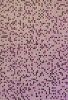 The texture of the wall, decorated with a mosaic of various small square tiles. Abstract pattern of ceramic tiles on the wall photo