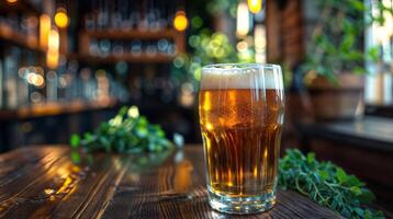 Beer glass with ale and foam on a wooden pub table featuring amber color and cozy atmosphere photo