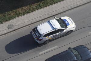 TERNOPIL, UKRAINE - JULY 7, 2023 Ukrainian patrol police white car with police lights and decals in daytime photo