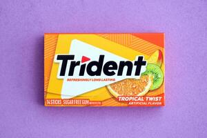 KYIV, UKRAINE - NOVEMBER 27, 2023 Trident chewing gum pack. Trident is famous US chewing gum brand photo